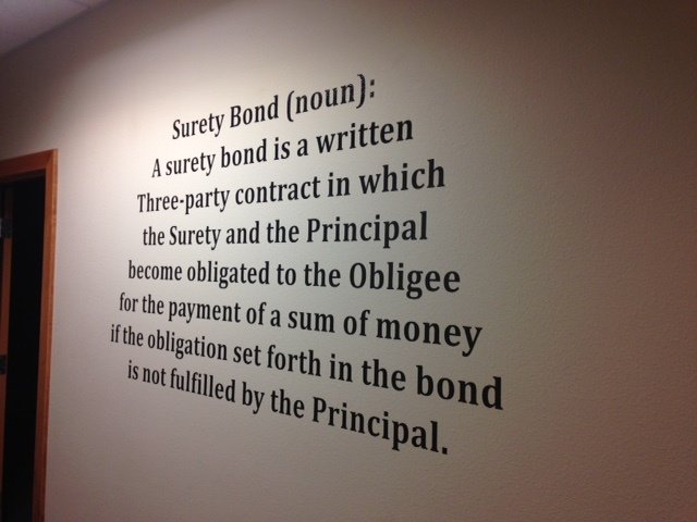 description of surety bond on wall