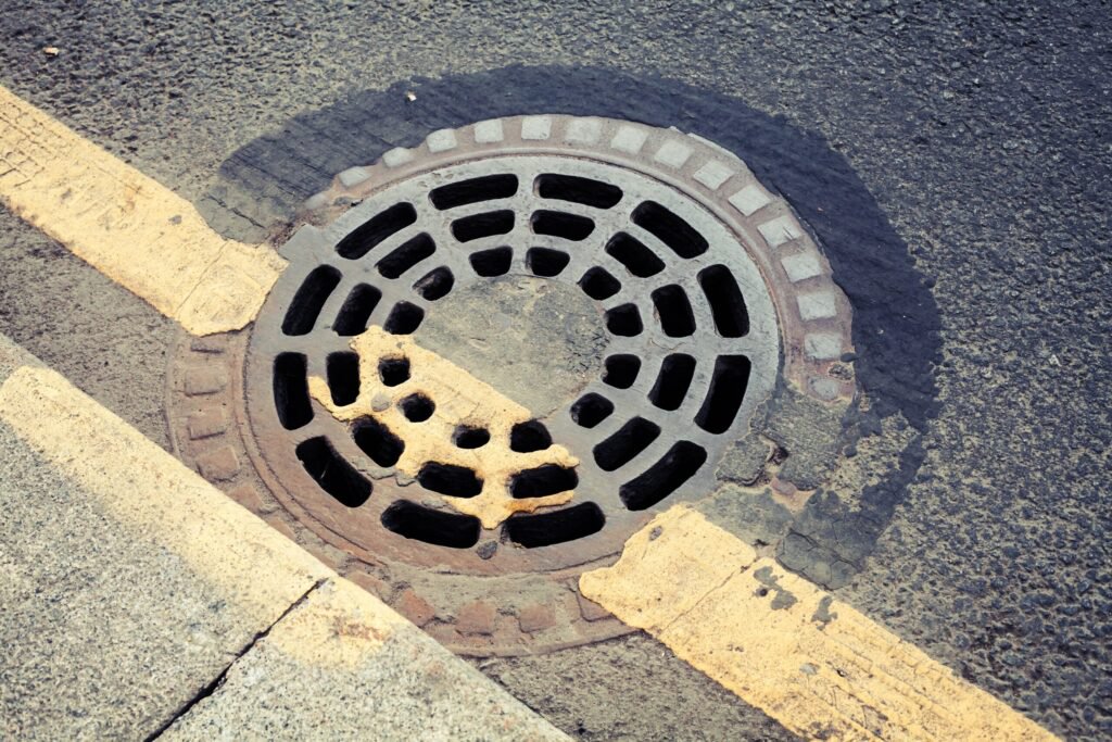 manhole in road
