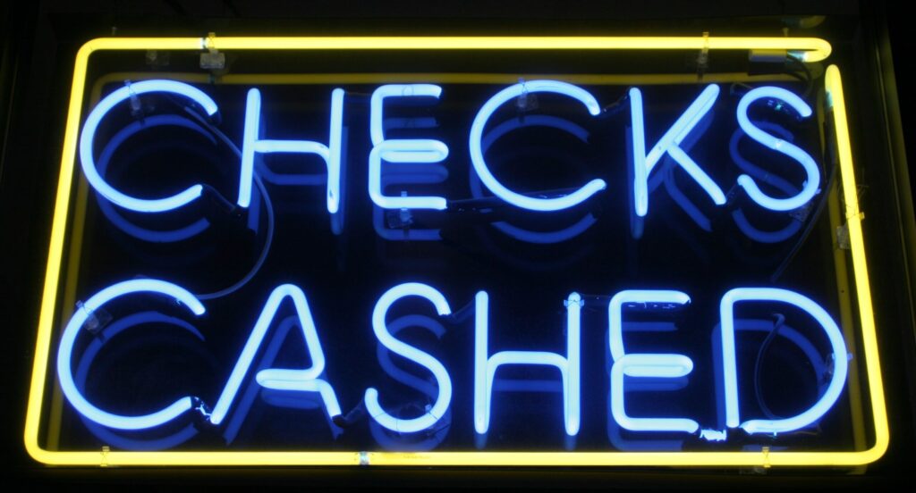 lit up checks cashed sign